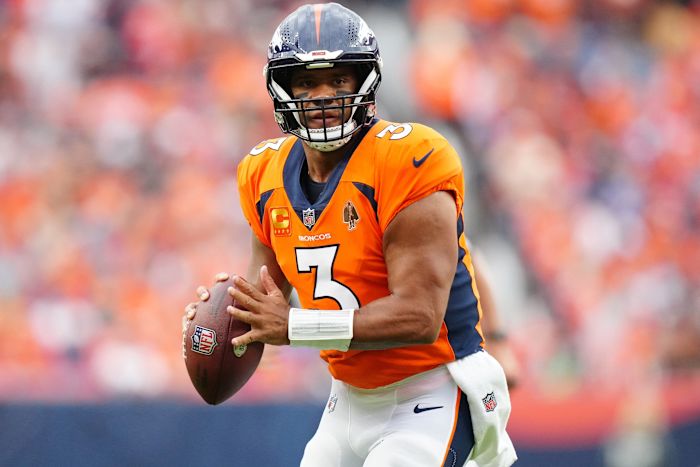 Denver Broncos quarterback Russell Wilson (3) prepares to pass to wide receiver Courtland Sutton (14) (not pictured) who scored a touchdown in the second quarter against the Las Vegas Raiders at Empower Field at Mile High.